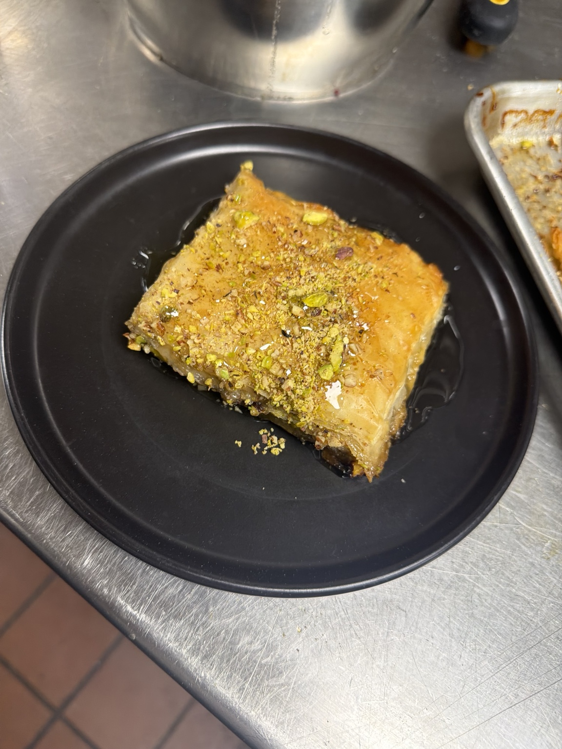 Baklava topped with pistachios at Sharbecue
