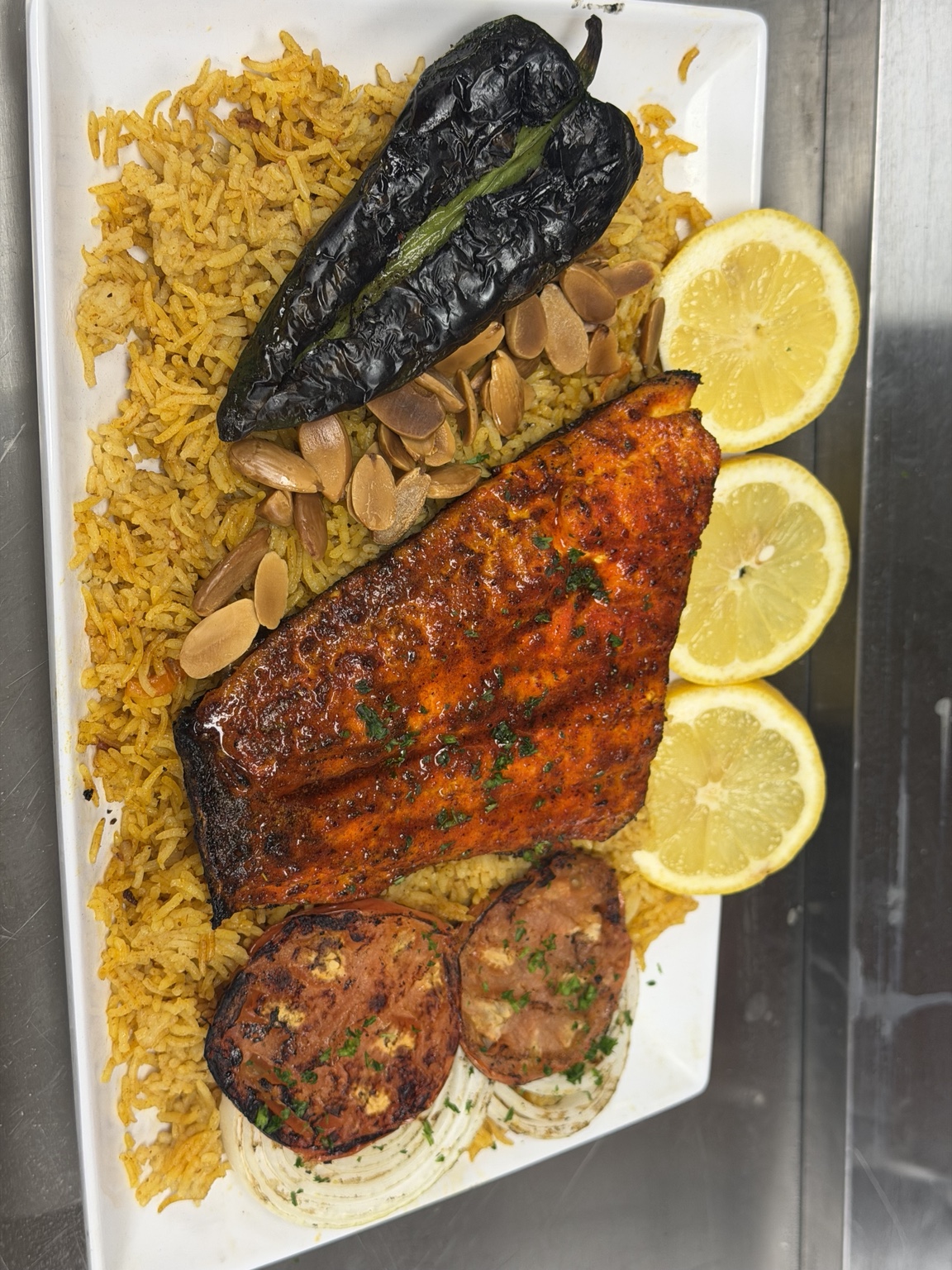 Sharbecue salmon with rice and grilled vegetables